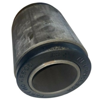 International truck walking beam pivot bush showing vulcanized rubber bonded between inner and outer steel sleeves.