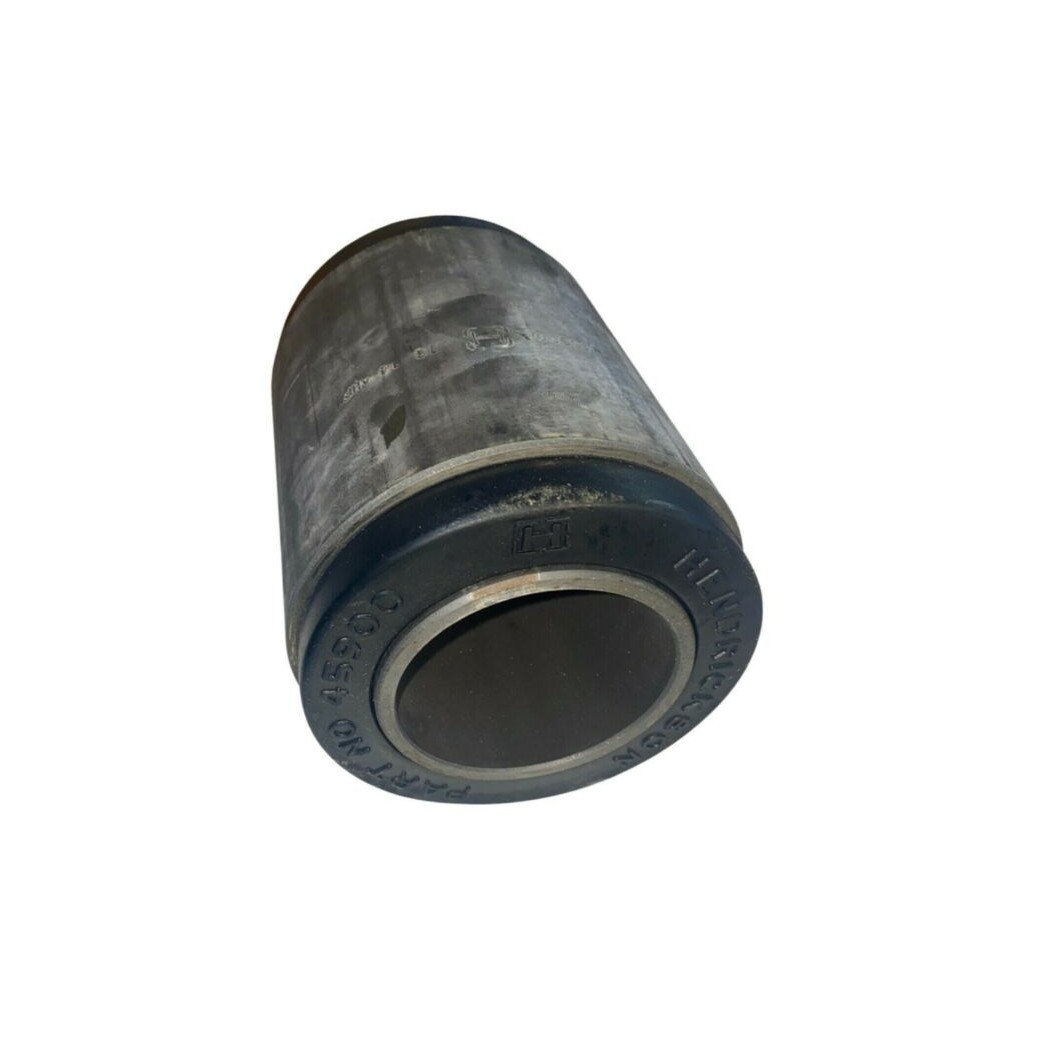 International truck walking beam pivot bush showing vulcanized rubber bonded between inner and outer steel sleeves.
