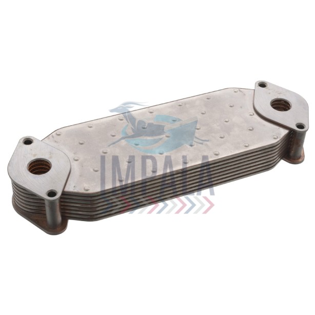Scania DC13 engine oil cooler showing finned heat exchanger core with oil and coolant connection ports.