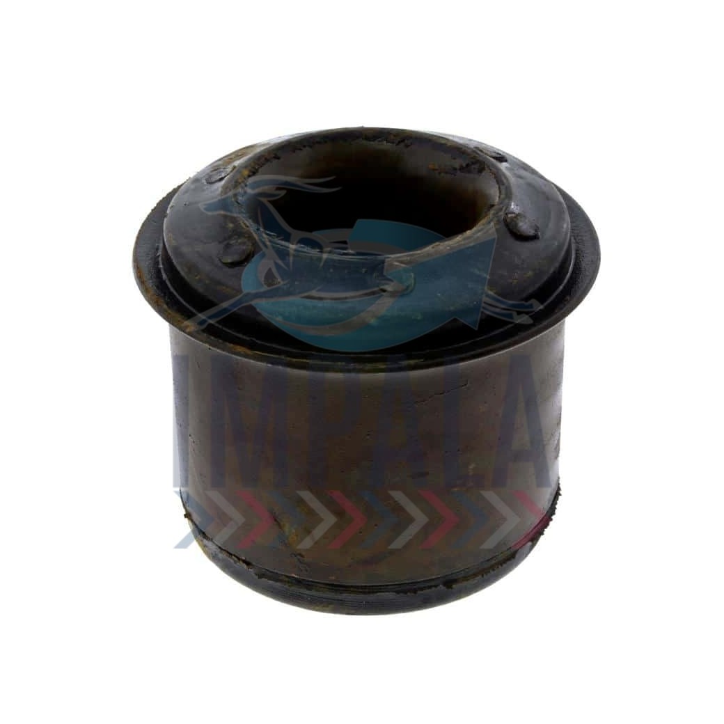 International Louisville truck rear engine mount showing cylindrical rubber isolator with steel mounting plates.