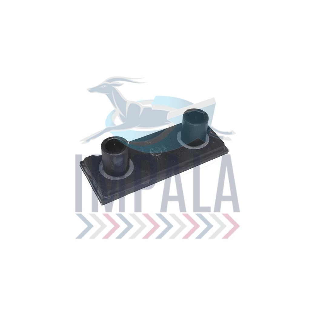 Freightliner Argosy lower front engine mount showing rubber isolator with steel mounting plates.