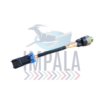 Commercial vehicle reverse light switch with electrical connector terminals.